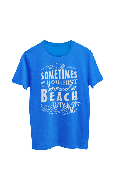 Royal blue heather unisex t-shirt featuring the text 'Sometimes you just need a Beach Day' alongside a beach scene complete with palm trees, sand, and waves. Designed by WooHoo Apparel